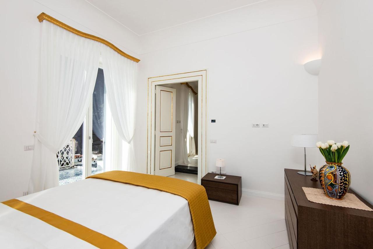Amore Rentals - Palazzo Della Storia Amalfi Eksteriør bilde
